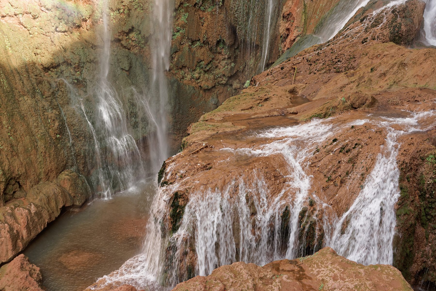 The Ouzoud falls dropping into the canyon in Morocco